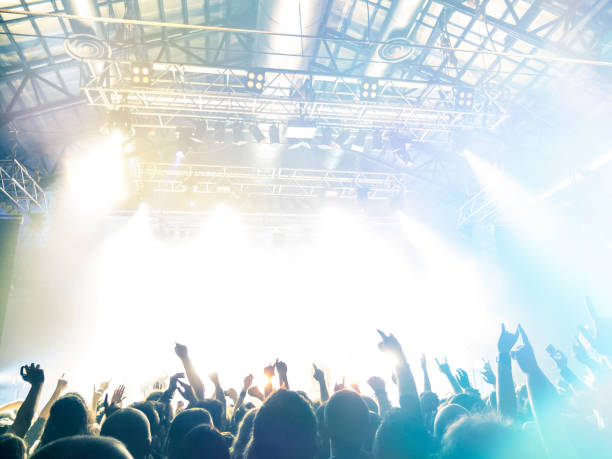 istock Filming concert on smart phone 1031124142