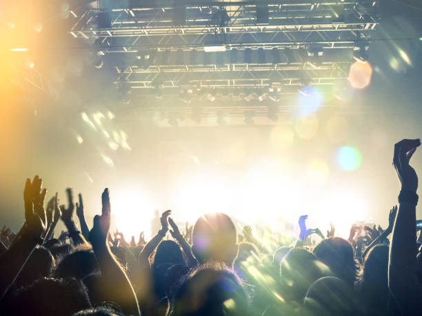istock Filming concert on smart phone 1031124150