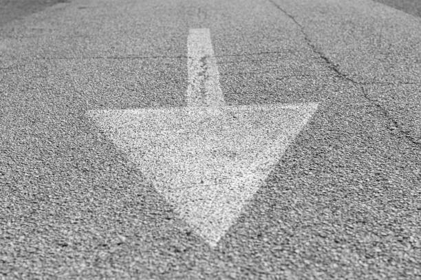 Arrow painted on the asphalt (Pesaro, Italy, Europe)