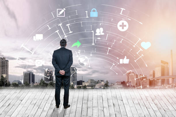 istock Businessman looking at business plan against city background 1031132342