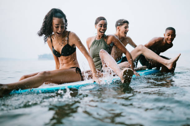 istock Young Adult Friends Explore Waterfront in Summer 1031151436