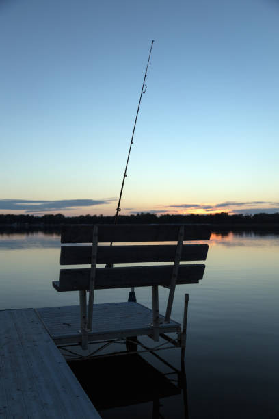 istock Aluminum Boat Dock on Lake at Sunset 1031167464