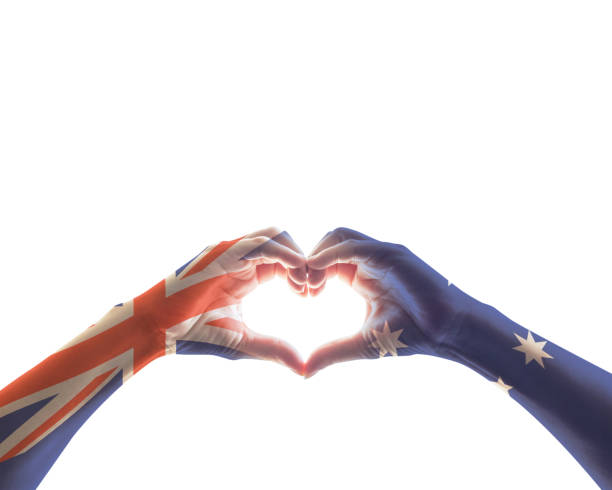 australia national flag  on people hands in heart shape isolated on white background for labour day and national holiday celebration - australia australia day celebration flag imagens e fotografias de stock