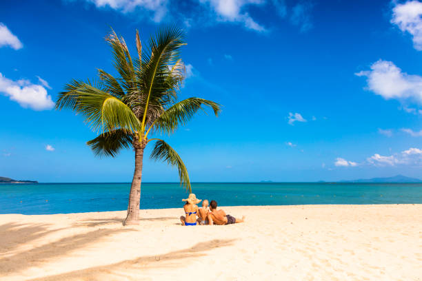 istock Family sitting at the beach 1031169840