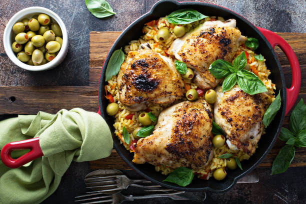 istock Roasted chicken thighs with rice and olives 1031193738
