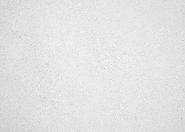 istock White cement texture plastered stucco wall painted fade background. 1031221164