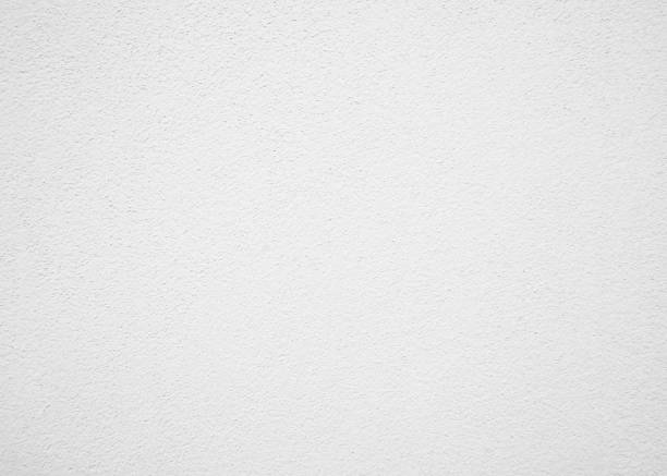 istock White cement texture plastered stucco wall painted fade background. 1031221168