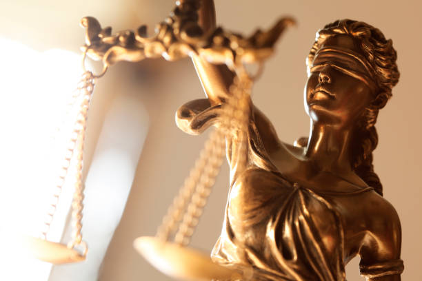 Close Up Of Blindfolded Lady Of Justice A close up of the head of the blindfolded Lady Justice. lawsuit photos stock pictures, royalty-free photos & images