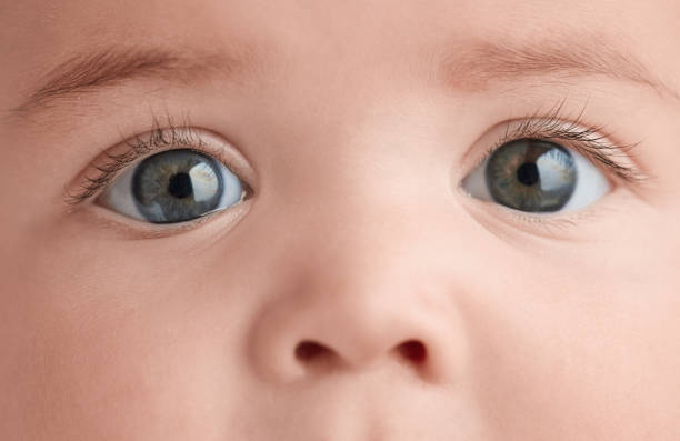 istock innocent baby girl eyes 1031246282