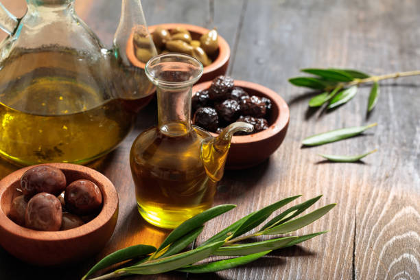 istock Olives and olive oil on a table 1031251494