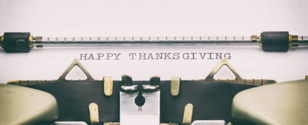 istock Close-up of happy thanksgiving text on paper 1031254690