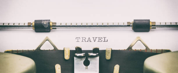 Travel word in capital letters on white sheet