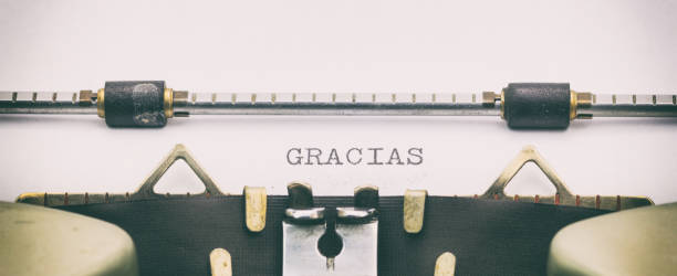 istock Gracias word in capital letters on white sheet 1031254716