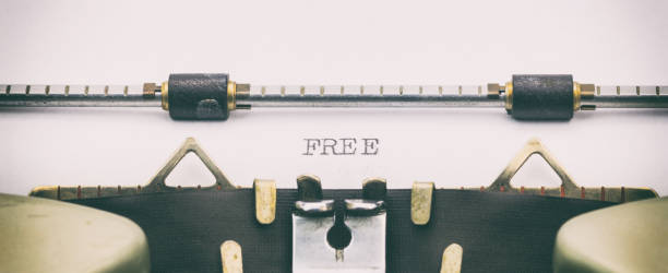 istock Free word in capital letters on white sheet 1031254744