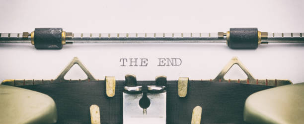 istock The End words in capital letters on white sheet 1031254752