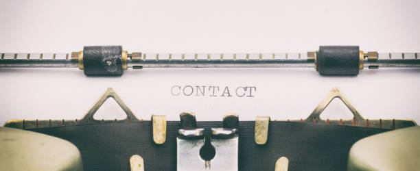istock Contact word in capital letters on white sheet 1031254770