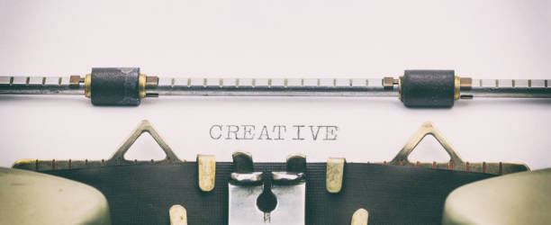 istock Creative word in capital letters on white sheet 1031254772