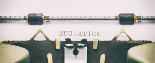 istock Education word in capital letters on white sheet 1031254774