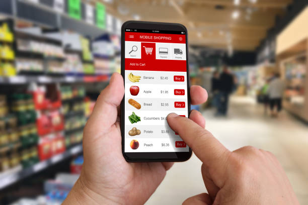 istock E-commerce internet shopping cart mobile phone app supermarket 1031269530