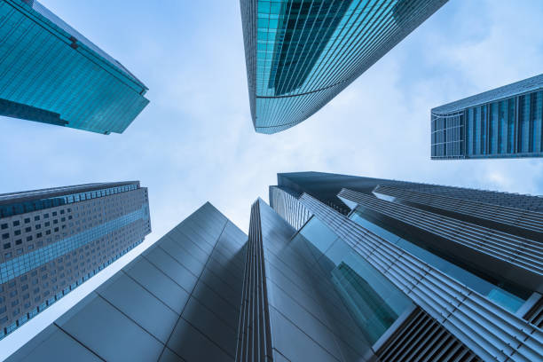istock Low angle view of modern metallic skyscrapers 1031288192