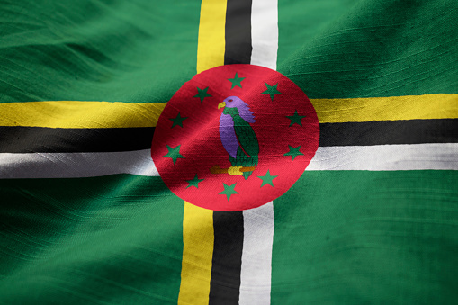 Closeup of Ruffled Dominica Flag, Dominica Flag Blowing in Wind