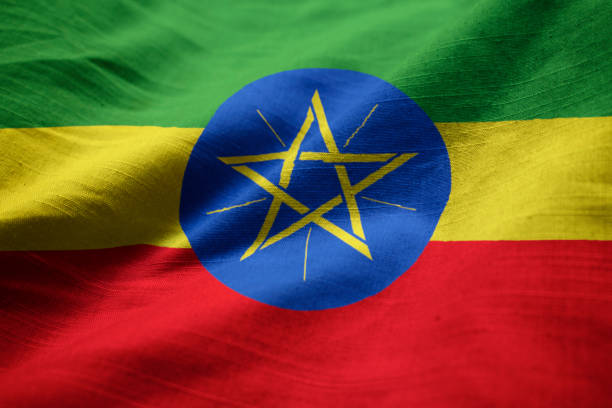nahaufnahme der gekräuselten äthiopien fahne - ethiopia stock-fotos und bilder
