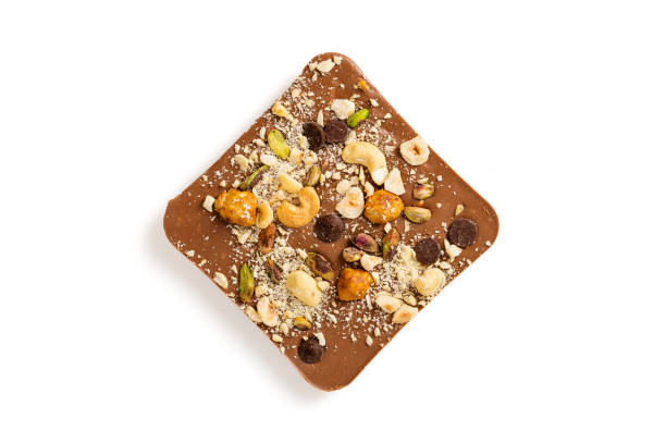 istock Luxury handmade chocolate with nuts isolated on white 1031318168