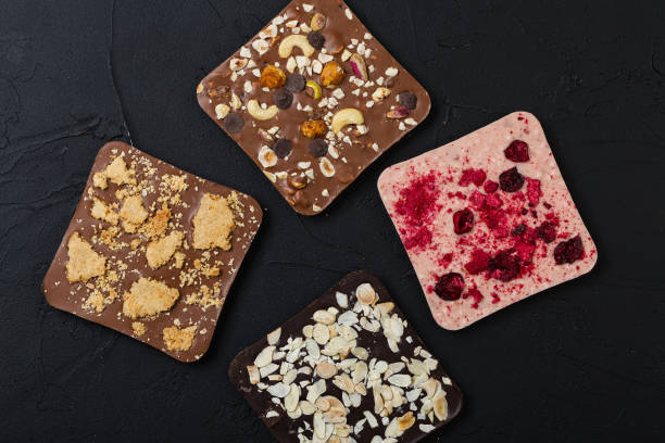 istock Luxury handmade chocolate on black background 1031318684