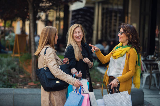 istock Cheerful mature women in shopping 1031320738