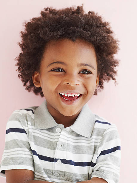 Boy Laughing  african american children stock pictures, royalty-free photos & images