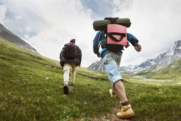 istock Tourists at trekking route in mountains 1031332776