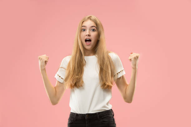 istock Winning success woman happy ecstatic celebrating being a winner. Dynamic energetic image of female model 1031336436