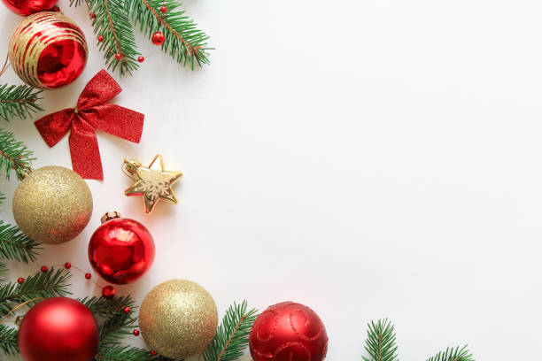 istock Christmas festive composition with pine branches, red and gold christmas decorations and copy space on white background, top view, flat lay. 1031337514