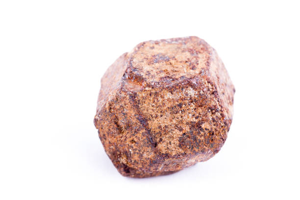 istock macro mineral garnet stone on white background close-up 1031344794