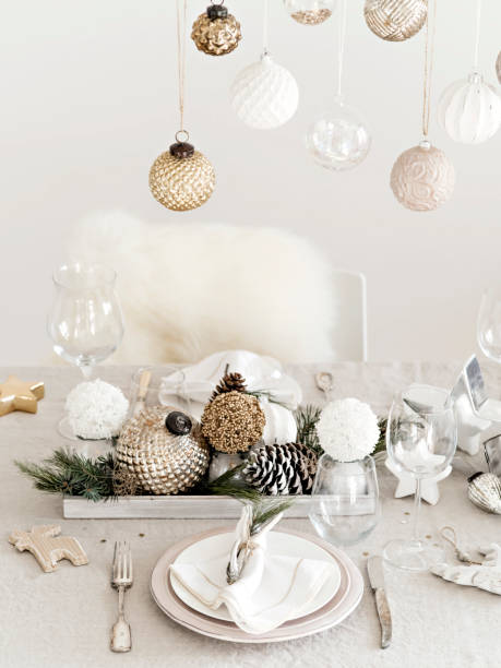 istock Golden and silver baubles in design of table setting. 1031348454