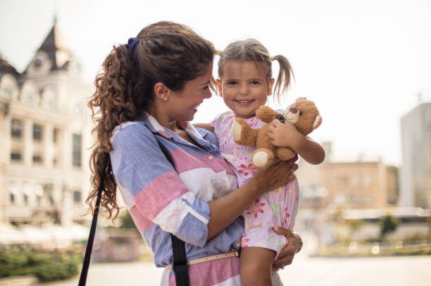 istock I'm safer in my mom's hands. 1031348512