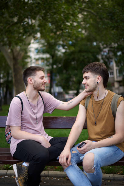 istock Gay couple in the park 1031362178