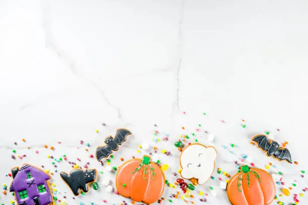 Photo of Halloween cookies and candies