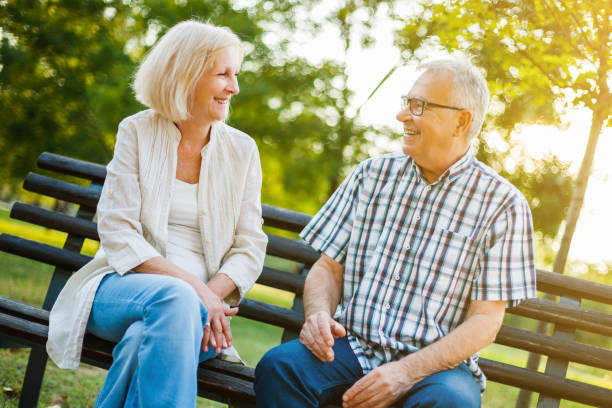 istock Senior man and woman in park 1031368814