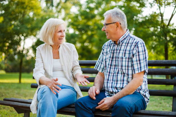 istock Senior man and woman in park 1031368836