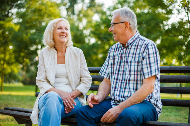 istock Senior man and woman in park 1031369198