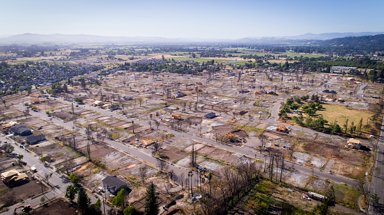 Drone photo shows fire damage in the Coffey Park neighborhood eight months after a massive fire destroyed the neighborhood. Only a handful of homes have been rebuilt.