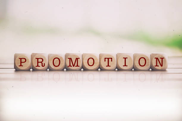 istock Promotion written on cube wooden blocks. 1031373426