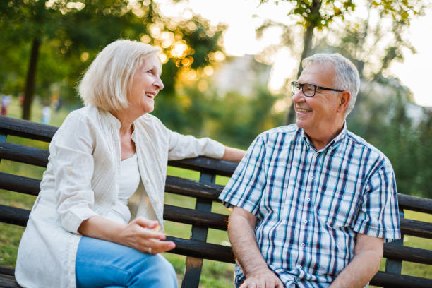 istock Senior man and woman in park 1031376392