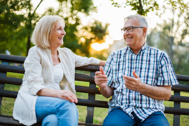 Senior man and woman in park