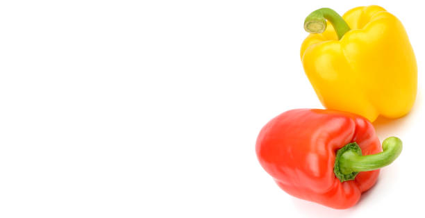 istock Yellow and red sweet pepper isolated on white background. 1031376680