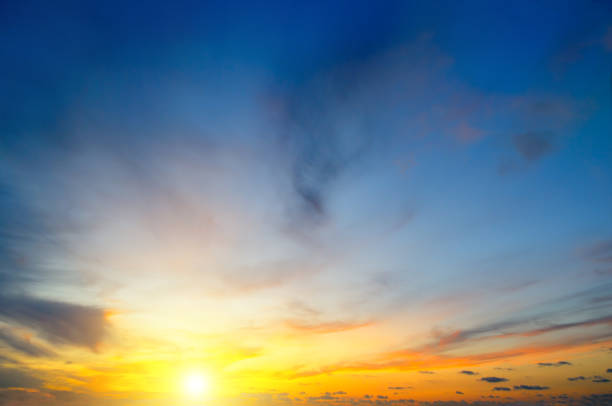 istock Cloudy sky and bright sunrise over the horizon. 1031376684