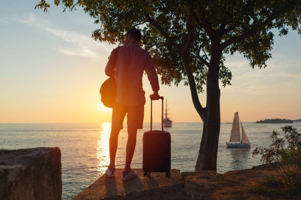 istock Man watching the spectacular sunset 1031377186