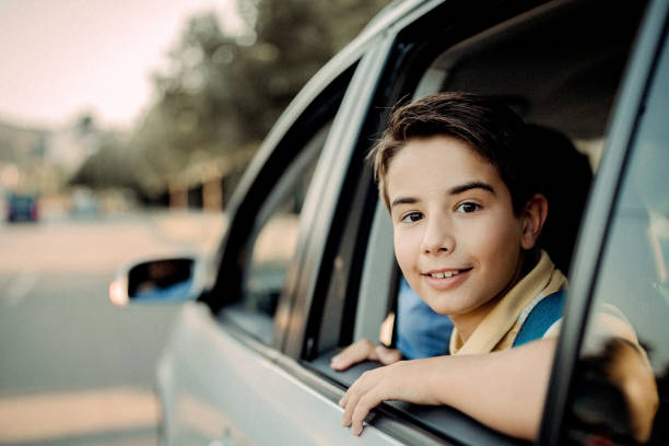 istock Father driving his son to school 1031384812