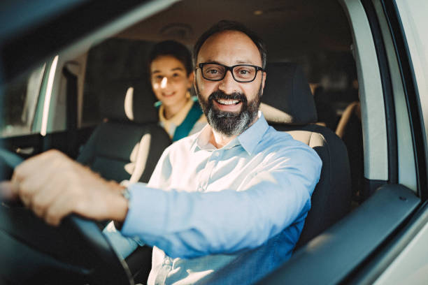 istock Father driving his son to school 1031385468